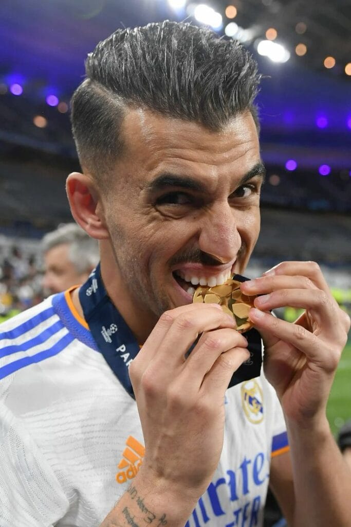 Dani Ceballos with a football in an iconic Bernabéu setting