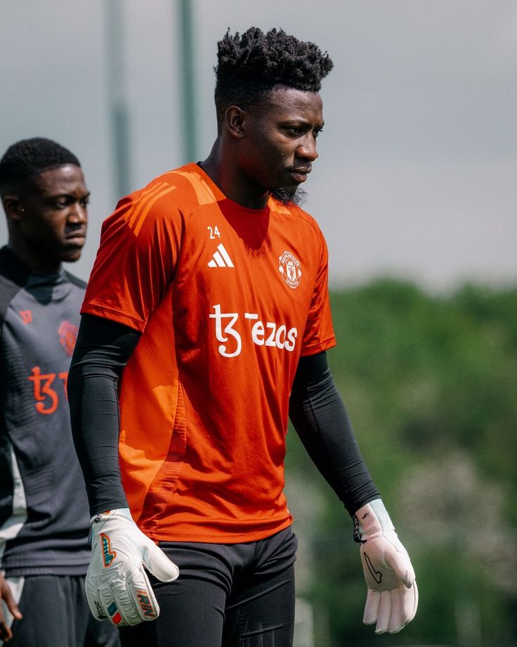 Cameroon goalkeeper André Onana in Manchester United jersey, Fabrizio Romano Instagram post confirming loan deal agreement with Trabzonspor.